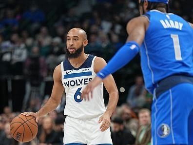 DALLAS, TX - DECEMBER 14: Jordan McLaughlin #6 of the Minnesota Timberwolves dribbles the ball during the game against the Dallas Mavericks on December 14, 2023 at the American Airlines Center in Dallas, Texas. NOTE TO USER: User expressly acknowledges and agrees that, by downloading and or using this photograph, User is consenting to the terms and conditions of the Getty Images License Agreement. Mandatory Copyright Notice: Copyright 2023 NBAE (Photo by Glenn James/NBAE via Getty Images)