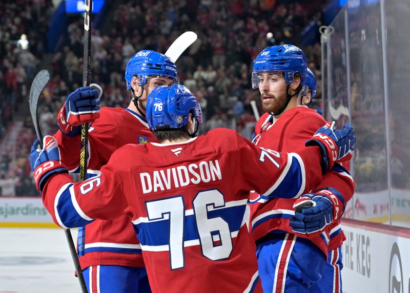 Sep 23, 2024; Montreal, Quebec, CAN; Montreal Canadiens forward Luke Tuch (88) celebrates with teammates after scoring a goal against the Philadelphia Flyers during the second period at the Bell Centre. Mandatory Credit: Eric Bolte-Imagn Images