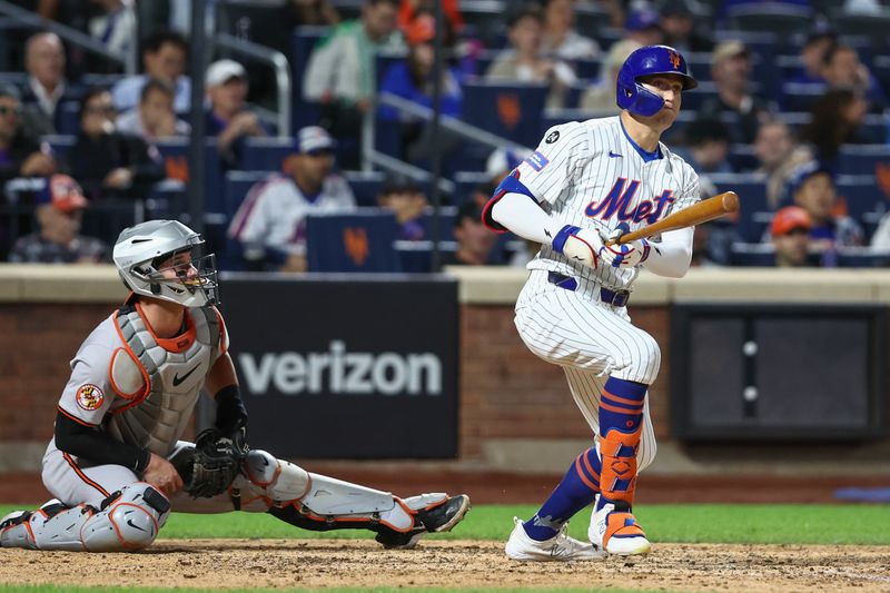 Aug 20, 2024; New York City, New York, USA;  New York Mets left fielder Brandon Nimmo (9) hits an RBI double in the eighth inning against the Baltimore Orioles at Citi Field. Mandatory Credit: Wendell Cruz-USA TODAY Sports