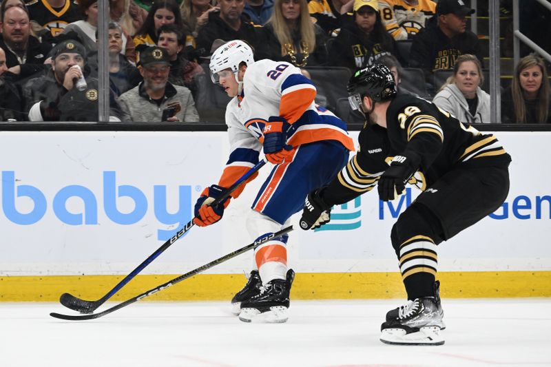 Nov 9, 2023; Boston, Massachusetts, USA; Boston Bruins defenseman Derek Forbort (28) defends New York Islanders right wing Hudson Fasching (20) during the second period at the TD Garden. Mandatory Credit: Brian Fluharty-USA TODAY Sports