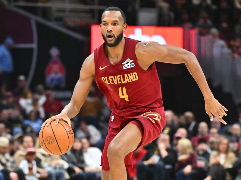 CLEVELAND, OHIO - JANUARY 09: Evan Mobley #4 of the Cleveland Cavaliers brings the ball up court during the second quarter against the Toronto Raptors at Rocket Mortgage Fieldhouse on January 09, 2025 in Cleveland, Ohio. NOTE TO USER: User expressly acknowledges and agrees that, by downloading and or using this photograph, User is consenting to the terms and conditions of the Getty Images License Agreement. (Photo by Jason Miller/Getty Images)