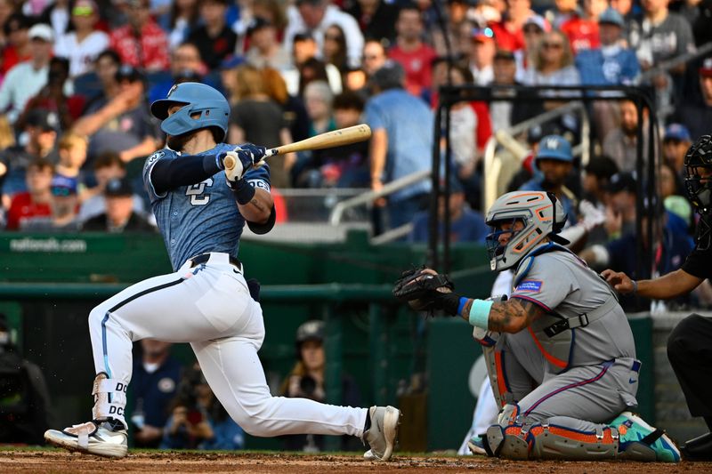 Apr 26, 2025; Washington, District of Columbia, USA; Washington Nationals outfielder Dylan Crews (3) singles against the New York Mets during the second inning at Nationals Park. Mandatory Credit: Brad Mills-Imagn Images