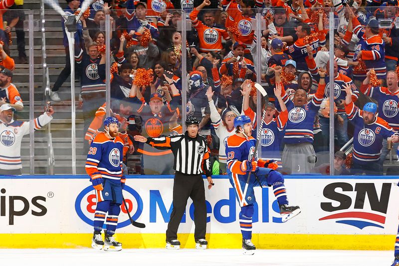 May 29, 2024; Edmonton, Alberta, CAN;   The Edmonton Oilers celebrate a goal scored by forward Mattias Janmark (13) during the second period against the Dallas Stars in game four of the Western Conference Final of the 2024 Stanley Cup Playoffs at Rogers Place. Mandatory Credit: Perry Nelson-USA TODAY Sports