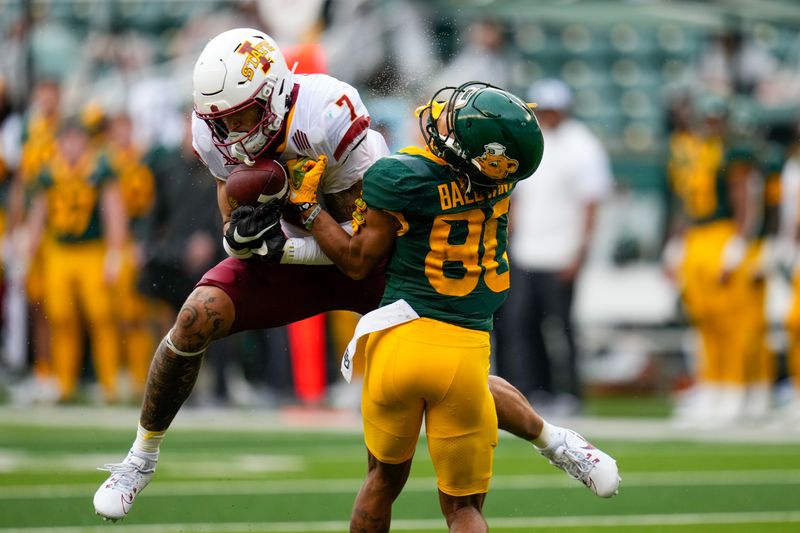 Oct 28, 2023; Waco, Texas, USA;  Iowa State Cyclones defensive back Malik Verdon (7) makes an interception against Baylor Bears wide receiver Monaray Baldwin (80) during the first half at McLane Stadium. Mandatory Credit: Chris Jones-USA TODAY Sports