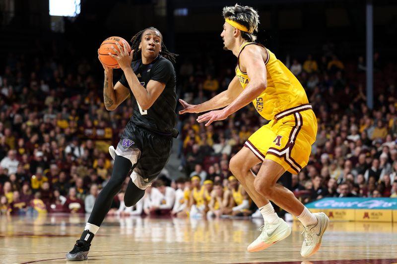 Feb 1, 2025; Minneapolis, Minnesota, USA; Washington Huskies guard Tyler Harris (8) works around Minnesota Golden Gophers forward Dawson Garcia (3) during the second half at Williams Arena. Mandatory Credit: Matt Krohn-Imagn Images