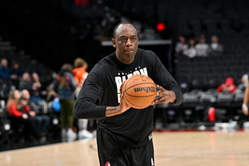 PORTLAND, OREGON - APRIL 09: Assistant coach Roy Rogers of the Portland Trail Blazers helps players warm up before the game \V| at the Moda Center on April 09, 2024 in Portland, Oregon. NOTE TO USER: User expressly acknowledges and agrees that, by downloading and or using this photograph, User is consenting to the terms and conditions of the Getty Images License Agreement. (Photo by Alika Jenner/Getty Images)