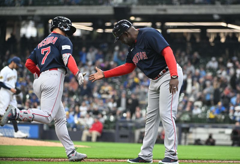 Apr 23, 2023; Milwaukee, Wisconsin, USA;Boston Red Sox left fielder Masataka Yoshida (7) celebrates with Boston Red Sox third base coach Carlos Febles (53) after hitting a home run against the Milwaukee Brewers in the eighth inning at American Family Field. Mandatory Credit: Michael McLoone-USA TODAY Sports 