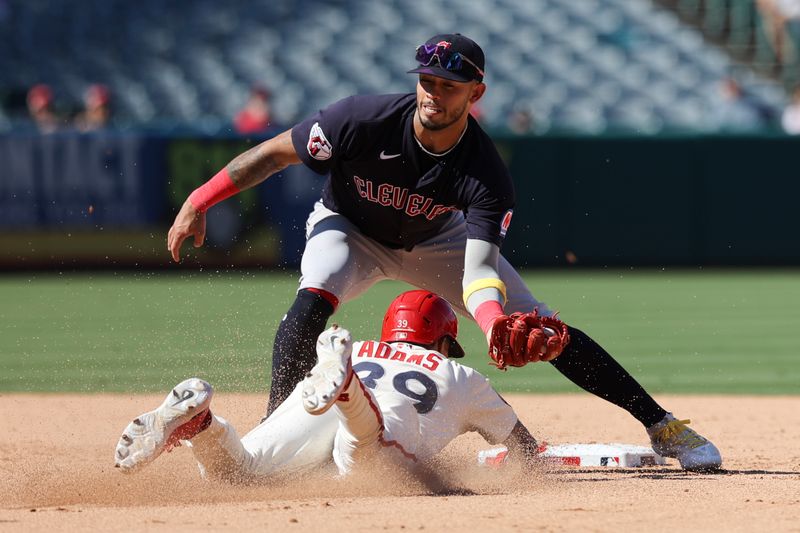 Sep 10, 2023; Anaheim, California, USA; Cleveland Guardians shortstop Gabriel Arias (13) tags out Los Angeles Angels center fielder Jordyn Adams (39) during the eighth inning at Angel Stadium. Mandatory Credit: Jessica Alcheh-USA TODAY Sports