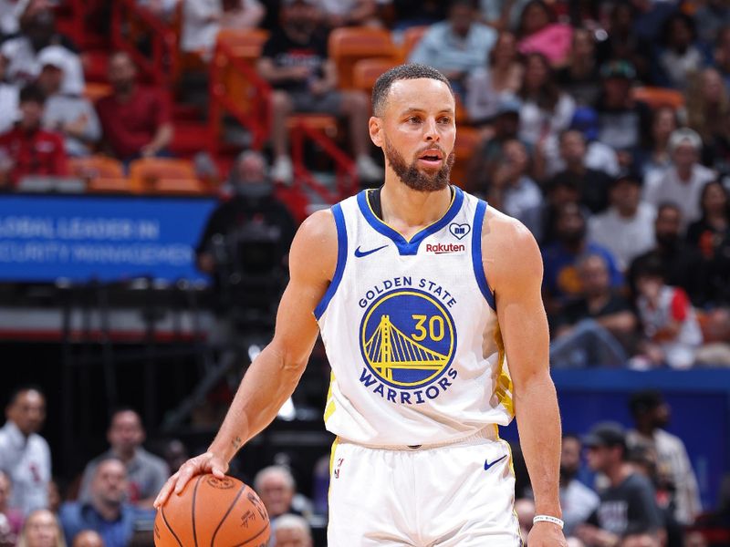 MIAMI, FL - MARCH 26: Stephen Curry #30 of the Golden State Warriors dribbles the ball during the game against the Miami Heat  on March 26, 2024 at Kaseya Center in Miami, Florida. NOTE TO USER: User expressly acknowledges and agrees that, by downloading and or using this Photograph, user is consenting to the terms and conditions of the Getty Images License Agreement. Mandatory Copyright Notice: Copyright 2024 NBAE (Photo by Jeff Haynes/NBAE via Getty Images)