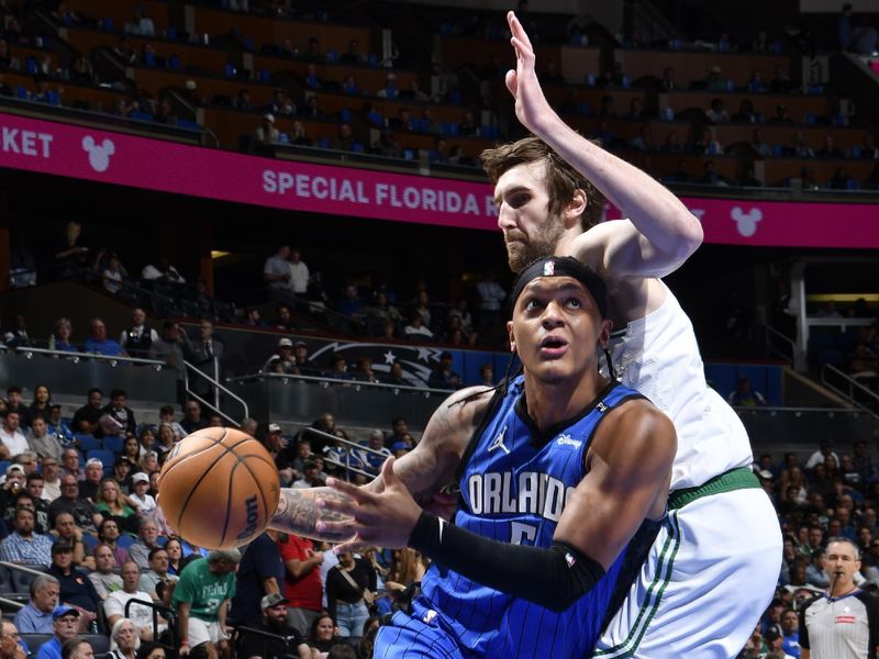 ORLANDO, FL - APRIL 9: Paolo Banchero #5 of the Orlando Magic handles the ball during the game against the Boston Celtics on April 9, 2025 at Kia Center in Orlando, Florida. NOTE TO USER: User expressly acknowledges and agrees that, by downloading and or using this photograph, User is consenting to the terms and conditions of the Getty Images License Agreement. Mandatory Copyright Notice: Copyright 2025 NBAE (Photo by Fernando Medina/NBAE via Getty Images)