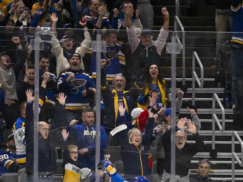 Dec 23, 2023; St. Louis, Missouri, USA;  St. Louis Blues center Jordan Kyrou (25) reacts after scoring against the Chicago Blackhawks during the third period at Enterprise Center. Mandatory Credit: Jeff Curry-USA TODAY Sports