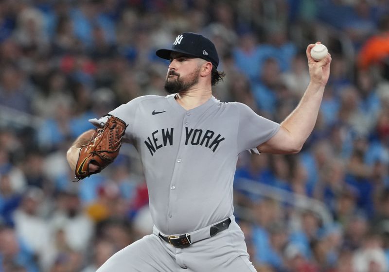 Jun 30, 2025; Toronto, Ontario, CAN; New York Yankees starting pitcher Carlos Rodon (55) throws a pitch against the Toronto Blue Jays during the first inning at Rogers Centre. Mandatory Credit: Nick Turchiaro-Imagn Images
