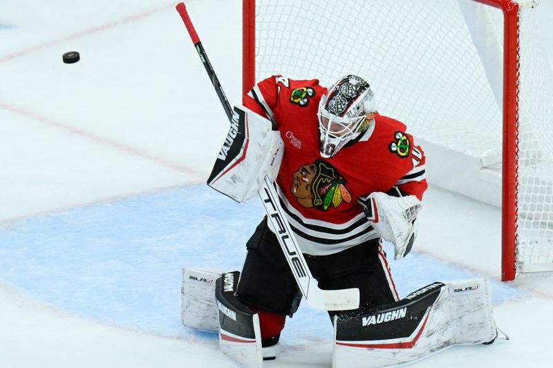 Oct 19, 2024; Chicago, Illinois, USA;  Chicago Blackhawks goaltender Arvid Soderblom (40) defends against the Buffalo Sabres during the third period at the United Center. Mandatory Credit: Matt Marton-Imagn Images