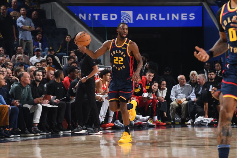 SAN FRANCISCO, CA - NOVEMBER 20: Andrew Wiggins #22 of the Golden State Warriors handles the ball during the game against the Atlanta Hawks on November 20, 2024 at Chase Center in San Francisco, California. NOTE TO USER: User expressly acknowledges and agrees that, by downloading and or using this photograph, user is consenting to the terms and conditions of Getty Images License Agreement. Mandatory Copyright Notice: Copyright 2024 NBAE (Photo by Noah Graham/NBAE via Getty Images)