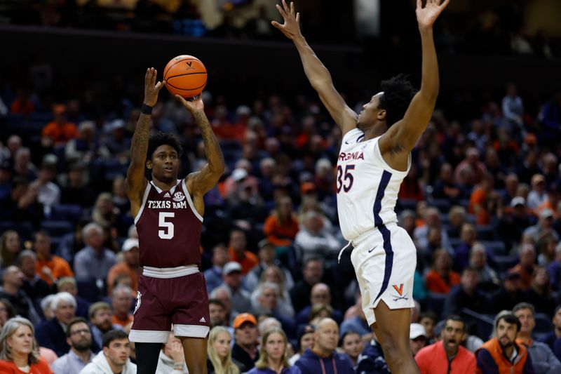 Nov 29, 2023; Charlottesville, Virginia, USA; Texas A&M Aggies guard Eli Lawrence (5) shoots the ball over Virginia Cavaliers guard Leon Bond III (35) in the first half at John Paul Jones Arena. Mandatory Credit: Geoff Burke-USA TODAY Sports