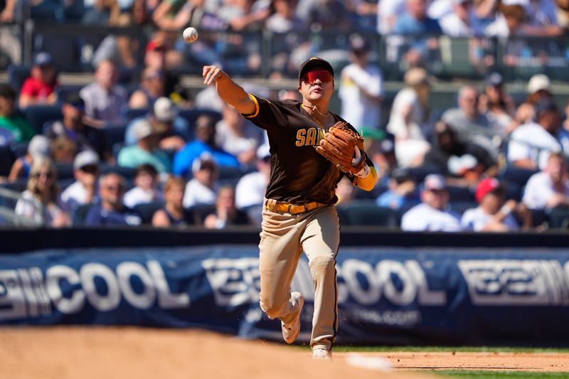 May 28, 2023; Bronx, New York, USA; San Diego Padres third baseman Ha-Seong Kim (7) throws out New York Yankees shortstop Anthony Volpe (11) (not pictured) after fielding a ground ball during the sixth inning at Yankee Stadium. Mandatory Credit: Gregory Fisher-USA TODAY Sports