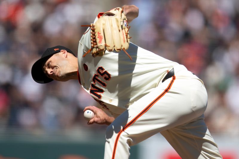 Aug 15, 2024; San Francisco, California, USA; San Francisco Giants pitcher Tyler Rogers (71) delivers against the Atlanta Braves during the eighth inning at Oracle Park. Mandatory Credit: D. Ross Cameron-USA TODAY Sports