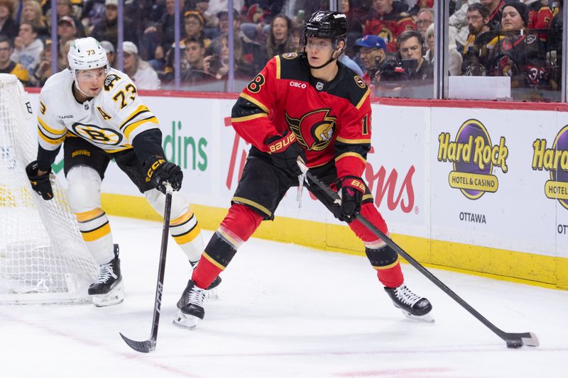 Oct 27, 2025; Ottawa, Ontario, CAN; Ottawa Senators center Tim Stutzle (18) skates with the puck in front of Boston Bruins defenseman Charlie McAvoy (73) in the first period at the Canadian Tire Centre. Mandatory Credit: Marc DesRosiers-IMAGN Images