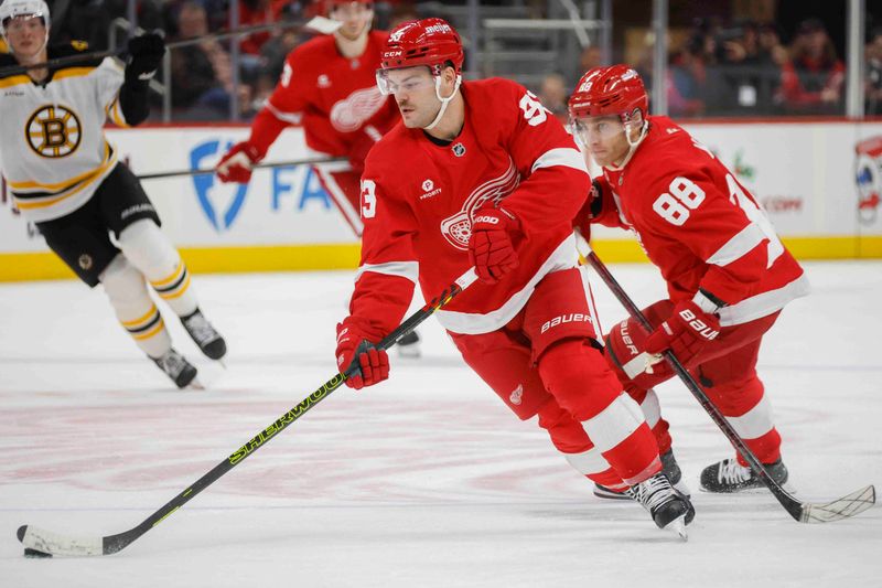 Nov 23, 2024; Detroit, Michigan, USA; Detroit Red Wings right wing Alex DeBrincat (93) handles the puck during the second period of the game against the Boston Bruins at Little Caesars Arena. Mandatory Credit: Brian Bradshaw Sevald-Imagn Images