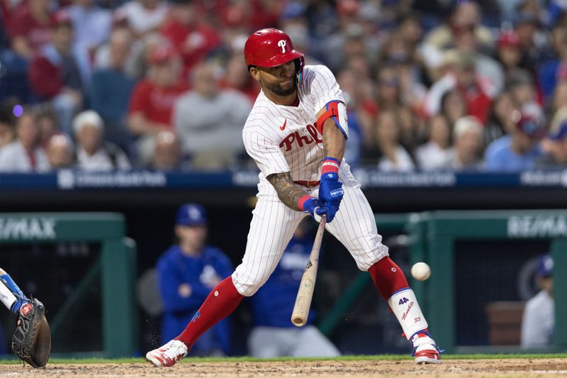 Jun 9, 2023; Philadelphia, Pennsylvania, USA; Philadelphia Phillies third baseman Edmundo Sosa (33) hits a single during the fifth inning against the Los Angeles Dodgers at Citizens Bank Park. Mandatory Credit: Bill Streicher-USA TODAY Sports