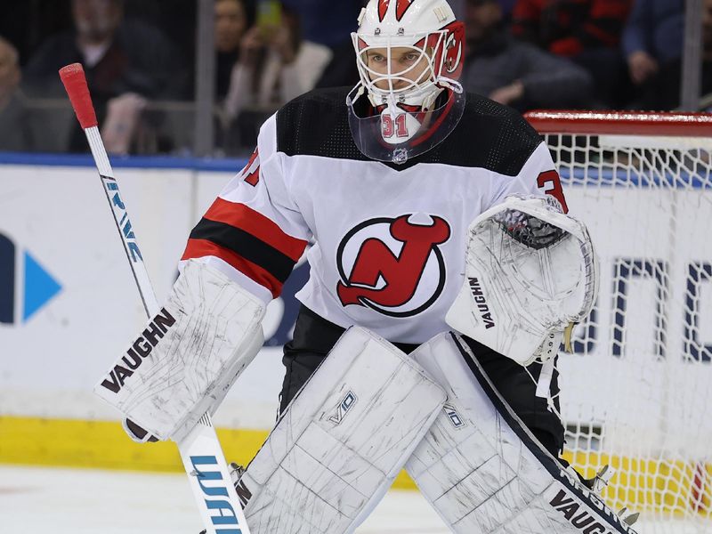 Mar 11, 2024; New York, New York, USA; New Jersey Devils goaltender Kaapo Kahkonen (31) tends net against the New York Rangers during the first period at Madison Square Garden. Mandatory Credit: Brad Penner-USA TODAY Sports