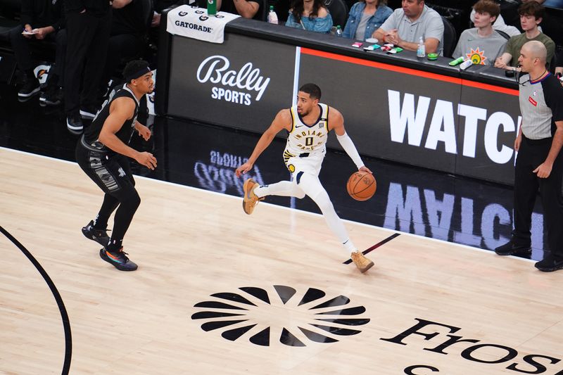 SAN ANTONIO, TX - MARCH 3: Tyrese Haliburton #0 of the Indiana Pacers dribbles the ball during the game against the San Antonio Spurs on March 3, 2024 at the AT&T Center in San Antonio, Texas. NOTE TO USER: User expressly acknowledges and agrees that, by downloading and or using this photograph, user is consenting to the terms and conditions of the Getty Images License Agreement. Mandatory Copyright Notice: Copyright 2024 NBAE (Photos by Cooper Neill/NBAE via Getty Images)