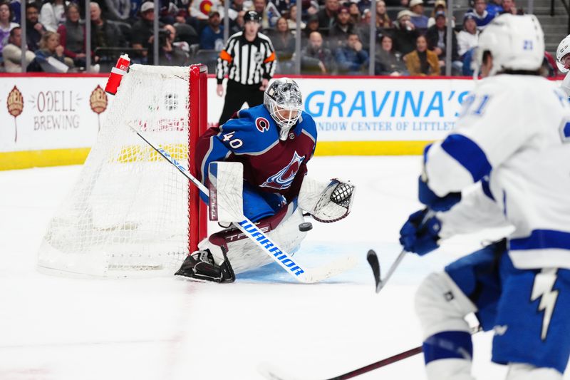 Nov 27, 2023; Denver, Colorado, USA; Tampa Bay Lightning center Steven Stamkos (91) shoots the puck at Colorado Avalanche goaltender Alexandar Georgiev (40) during the third period \at Ball Arena. Mandatory Credit: Ron Chenoy-USA TODAY Sports