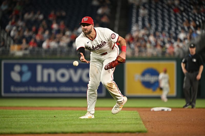 May 20, 2024; Washington, District of Columbia, USA; Washington Nationals first base Joey Gallo (24) tosses the ball to first base for the final out against the Minnesota Twins during the ninth inning at Nationals Park. Mandatory Credit: Rafael Suanes-USA TODAY Sports