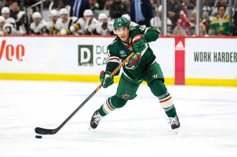 Apr 3, 2023; Saint Paul, Minnesota, USA; Minnesota Wild defenseman Jared Spurgeon (46) passes during the second period against the Vegas Golden Knights at Xcel Energy Center. Mandatory Credit: Matt Krohn-USA TODAY Sports