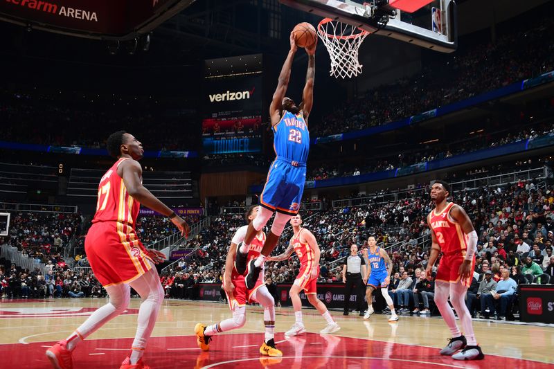 ATLANTA, GA - JANUARY 3: Cason Wallace #22 of the Oklahoma City Thunder drives to the basket during the game against the Atlanta Hawks on January 3, 2024 at State Farm Arena in Atlanta, Georgia.  NOTE TO USER: User expressly acknowledges and agrees that, by downloading and/or using this Photograph, user is consenting to the terms and conditions of the Getty Images License Agreement. Mandatory Copyright Notice: Copyright 2024 NBAE (Photo by Scott Cunningham/NBAE via Getty Images)