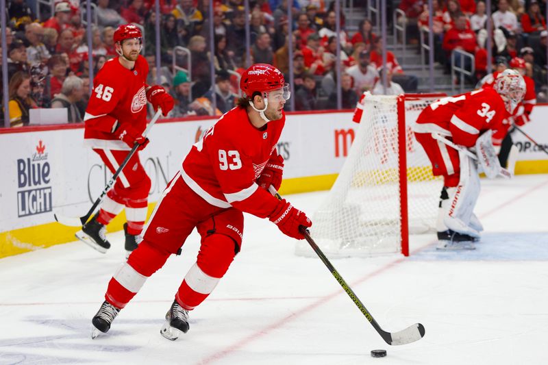 Dec 31, 2023; Detroit, Michigan, USA; Detroit Red Wings right wing Alex DeBrincat (93) handles the puck during the first period of the game between the Boston Bruins and the Detroit Red Wings at Little Caesars Arena. Mandatory Credit: Brian Bradshaw Sevald-USA TODAY Sports