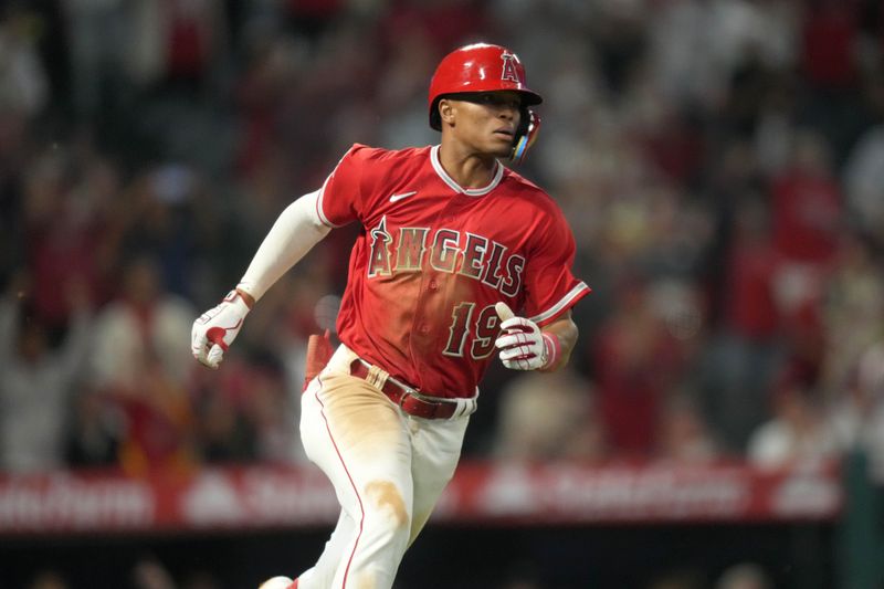 Sep 7, 2023; Anaheim, California, USA; Los Angeles Angels shortstop Kyren Paris (19) runs to first base on a run-scoring single in the ninth inning against the Cleveland Guardians at Angel Stadium. Mandatory Credit: Kirby Lee-USA TODAY Sports