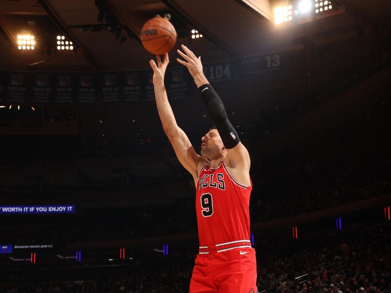 NEW YORK, NY - NOVEMBER 13: Nikola Vucevic #9 of the Chicago Bulls shoots the ball during the game against the New York Knicks on November 13, 2024 at Madison Square Garden in New York City, New York.  NOTE TO USER: User expressly acknowledges and agrees that, by downloading and or using this photograph, User is consenting to the terms and conditions of the Getty Images License Agreement. Mandatory Copyright Notice: Copyright 2024 NBAE  (Photo by Joe Murphy/NBAE via Getty Images)