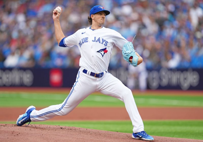 Sep 9, 2023; Toronto, Ontario, CAN; Toronto Blue Jays starting pitcher Kevin Gausman (34) pitches against the Kansas City Royals during the first inning at Rogers Centre. Mandatory Credit: Nick Turchiaro-USA TODAY Sports