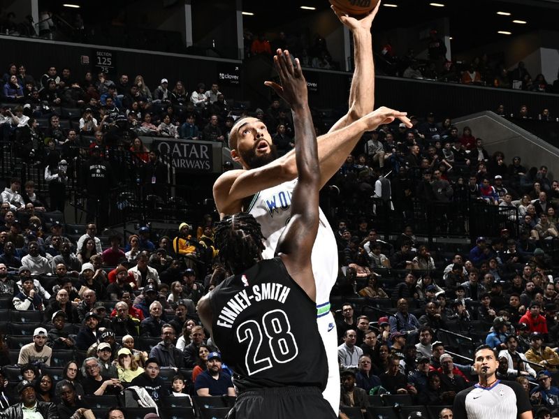 BROOKLYN, NY - JANUARY 25: Rudy Gobert #27 of the Minnesota Timberwolves drives to the basket during the game against the Brooklyn Nets on January 25, 2024 at Barclays Center in Brooklyn, New York. NOTE TO USER: User expressly acknowledges and agrees that, by downloading and or using this Photograph, user is consenting to the terms and conditions of the Getty Images License Agreement. Mandatory Copyright Notice: Copyright 2024 NBAE (Photo by David Dow/NBAE via Getty Images)