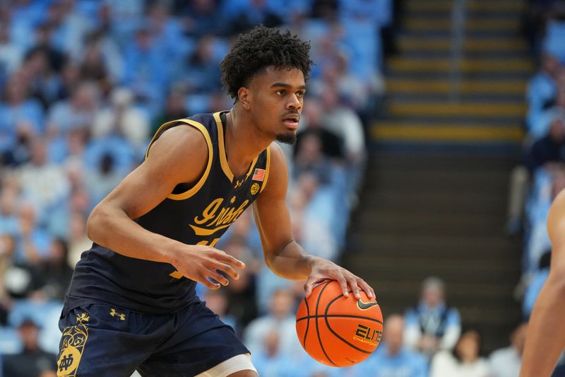 Jan 21, 2026; Chapel Hill, North Carolina, USA; Notre Dame Fighting Irish forward Jalen Haralson (10) with the ball in the first half at Dean E. Smith Center. Mandatory Credit: Bob Donnan-Imagn Images