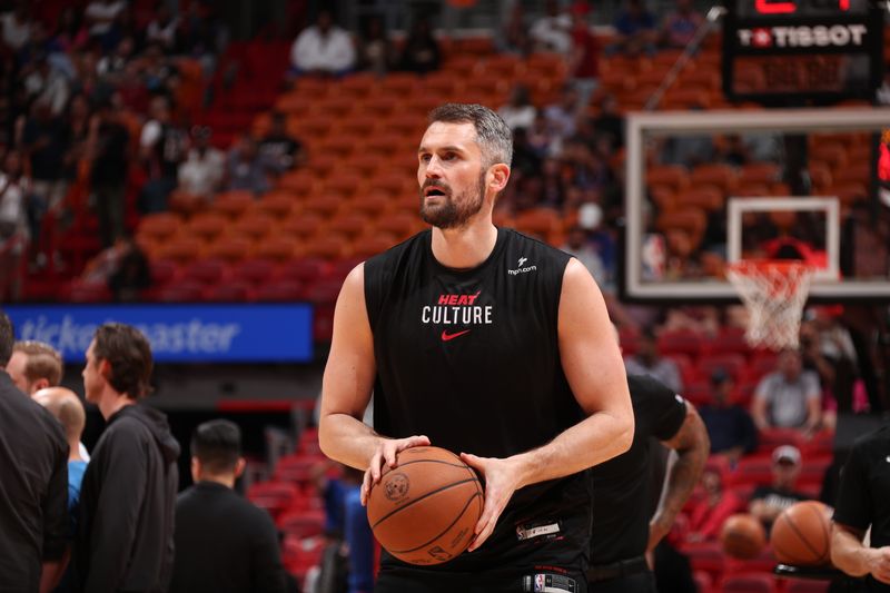 MIAMI, FL - APRIL 2: Kevin Love #42 of the Miami Heat warms up before the game against the New York Knicks on April 2, 2024 at Kaseya Center in Miami, Florida. NOTE TO USER: User expressly acknowledges and agrees that, by downloading and or using this Photograph, user is consenting to the terms and conditions of the Getty Images License Agreement. Mandatory Copyright Notice: Copyright 2024 NBAE (Photo by Issac Baldizon/NBAE via Getty Images)