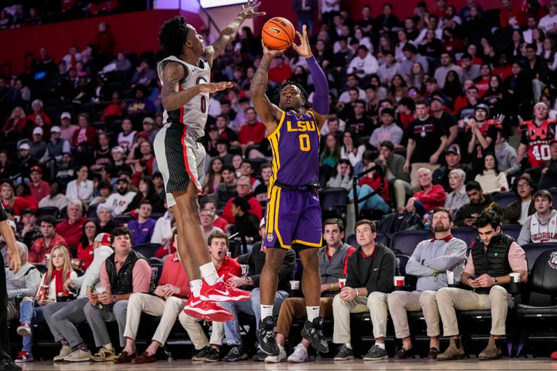 Feb 14, 2023; Athens, Georgia, USA; LSU Tigers guard Trae Hannibal (0) shoots over top of Georgia Bulldogs guard Terry Roberts (0) during the first half at Stegeman Coliseum. Mandatory Credit: Dale Zanine-USA TODAY Sports