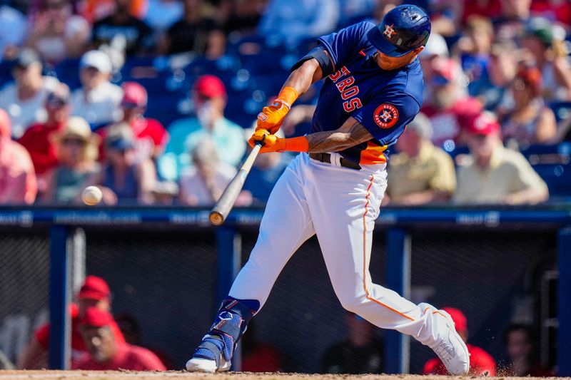 Mar 5, 2023; West Palm Beach, Florida, USA; Houston Astros right fielder Bligh Madris (66) hits a single against the Washington Nationals during the fifth inning at The Ballpark of the Palm Beaches. Mandatory Credit: Rich Storry-USA TODAY Sports