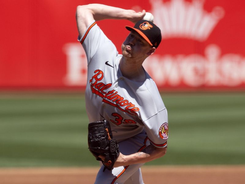 Aug 20, 2023; Oakland, California, USA; Baltimore Orioles starting pitcher Kyle Bradish (39) delivers a pitch against the Oakland Athletics during the first inning at Oakland-Alameda County Coliseum. Mandatory Credit: D. Ross Cameron-USA TODAY Sports