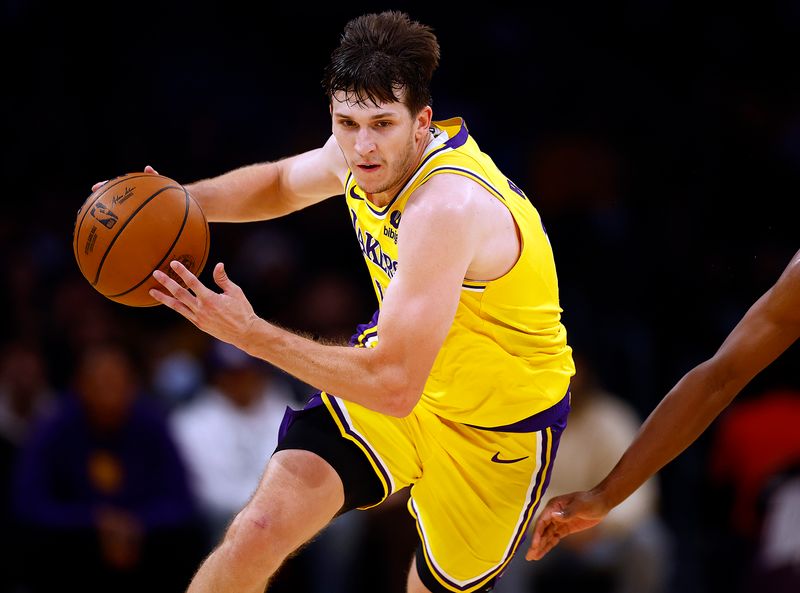 LOS ANGELES, CALIFORNIA - NOVEMBER 15:   Austin Reaves #15 of the Los Angeles Lakers at Crypto.com Arena on November 15, 2023 in Los Angeles, California.  NOTE TO USER: User expressly acknowledges and agrees that, by downloading and/or using this photograph, user is consenting to the terms and conditions of the Getty Images License Agreement. (Photo by Ronald Martinez/Getty Images)