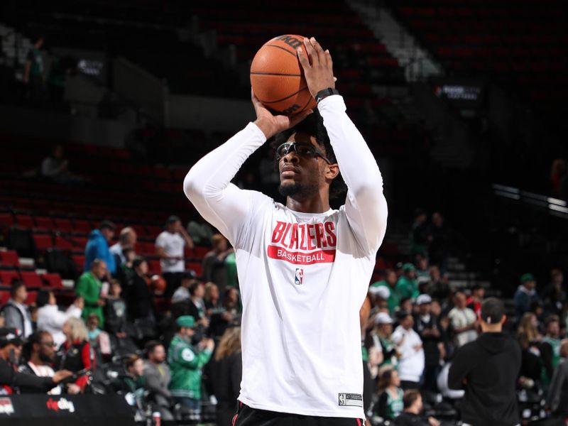 PORTLAND, OR - MARCH 11: Scoot Henderson #00 of the Portland Trail Blazers warms up before the game against the Boston Celtics on March 11, 2024 at the Moda Center Arena in Portland, Oregon. NOTE TO USER: User expressly acknowledges and agrees that, by downloading and or using this photograph, user is consenting to the terms and conditions of the Getty Images License Agreement. Mandatory Copyright Notice: Copyright 2024 NBAE (Photo by Cameron Browne/NBAE via Getty Images)