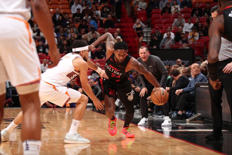 MIAMI, FL - JANUARY 29: Haywood Highsmith #24 of the Miami Heat handles the ball during the game against the Phoenix Suns on January 29, 2024 at Kaseya Center in Miami, Florida. NOTE TO USER: User expressly acknowledges and agrees that, by downloading and or using this Photograph, user is consenting to the terms and conditions of the Getty Images License Agreement. Mandatory Copyright Notice: Copyright 2024 NBAE (Photo by Issac Baldizon/NBAE via Getty Images)