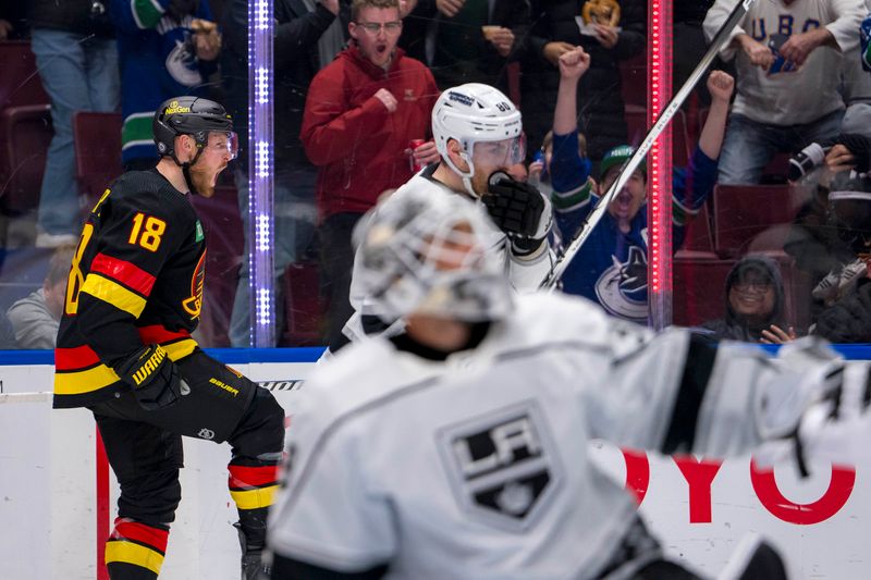 Mar 25, 2024; Vancouver, British Columbia, CAN; Vancouver Canucks forward Sam Lafferty (18) celebrates his goal scored on Los Angeles Kings goalie Cam Talbot (39) in the first period at Rogers Arena. Mandatory Credit: Bob Frid-USA TODAY Sports