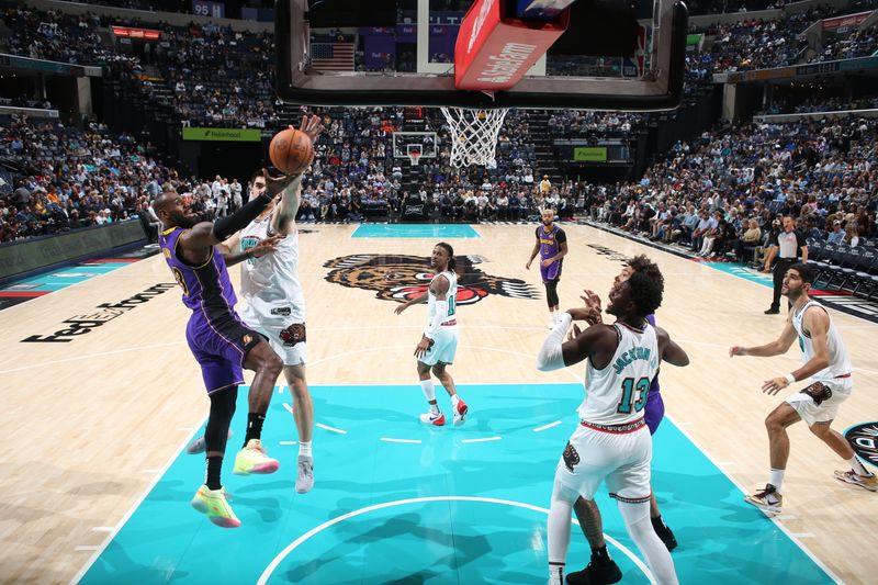 MEMPHIS, TN - NOVEMBER 6: LeBron James #23 of the Los Angeles Lakers drives to the basket during the game against the Memphis Grizzlies on November 6, 2024 at FedExForum in Memphis, Tennessee. NOTE TO USER: User expressly acknowledges and agrees that, by downloading and or using this photograph, User is consenting to the terms and conditions of the Getty Images License Agreement. Mandatory Copyright Notice: Copyright 2024 NBAE (Photo by Joe Murphy/NBAE via Getty Images)