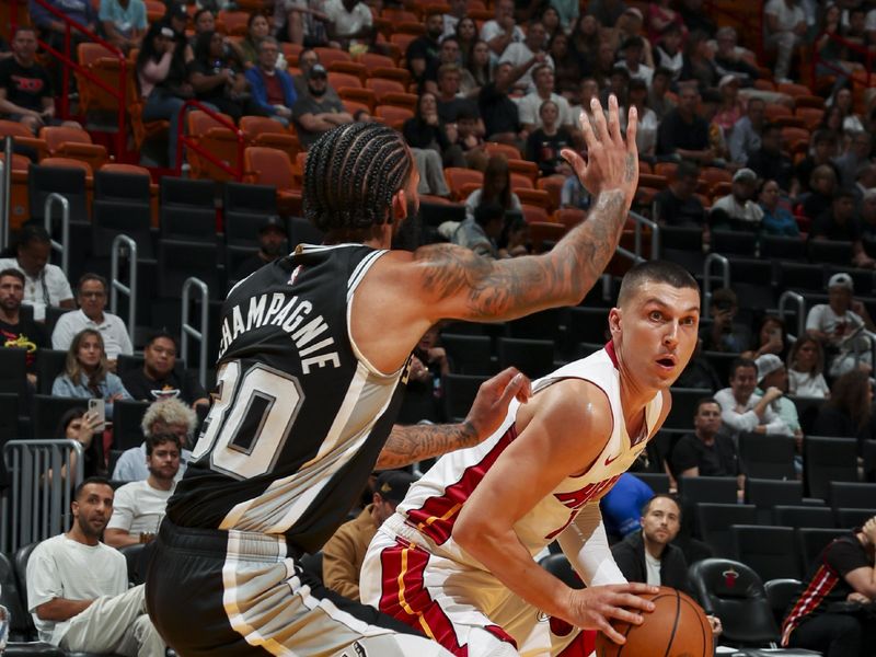 MIAMI, FL - OCTOBER 15: Tyler Herro #14 of the Miami Heat handles the ball during the game on October 15, 2024 at Kaseya Center in Miami, Florida. NOTE TO USER: User expressly acknowledges and agrees that, by downloading and or using this Photograph, user is consenting to the terms and conditions of the Getty Images License Agreement. Mandatory Copyright Notice: Copyright 2024 NBAE (Photo by Issac Baldizon/NBAE via Getty Images)