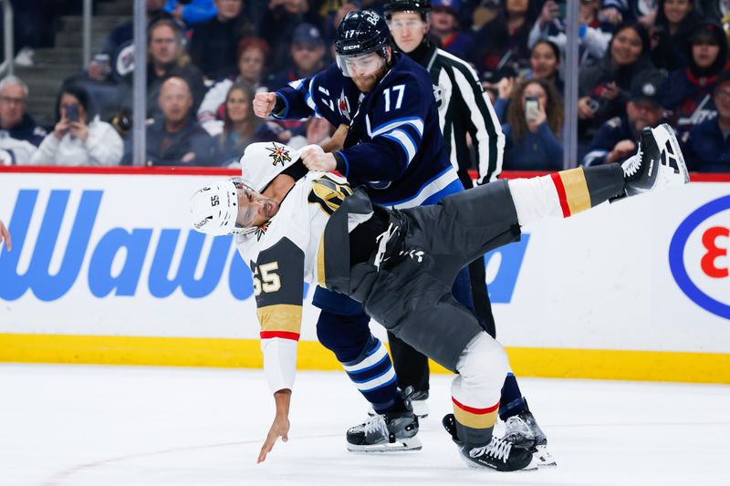Jan 6, 2026; Winnipeg, Manitoba, CAN;  Winnipeg Jets forward Adam Lowry (17) fights Vegas Golden Knights forward Keegan Kolesar (55) during the first period at Canada Life Centre. Mandatory Credit: Terrence Lee-Imagn Images