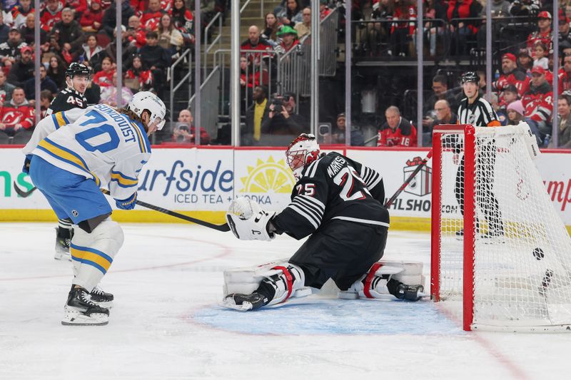 Nov 26, 2025; Newark, New Jersey, USA; St. Louis Blues defenseman Cam Fowler (17) (not pictured) scores a goal on New Jersey Devils goaltender Jacob Markstrom (25) during the first at Prudential Center. Mandatory Credit: Ed Mulholland-Imagn Images