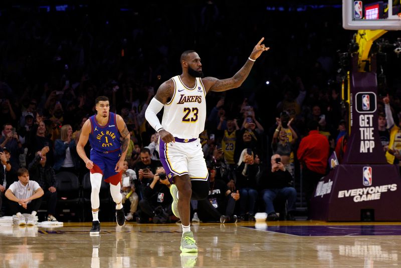 LOS ANGELES, CALIFORNIA - MARCH 2: LeBron James #23 of the Los Angeles Lakers reacts after scoring his 40,000th career point during the first half against the Michael Porter Jr. #1 of the Denver Nuggets at Crypto.com Arena on March 2, 2024 in Los Angeles, California. NOTE TO USER: User expressly acknowledges and agrees that, by downloading and or using this photograph, User is consenting to the terms and conditions of the Getty Images License Agreement.(Photo by Kevork Djansezian/Getty Images)