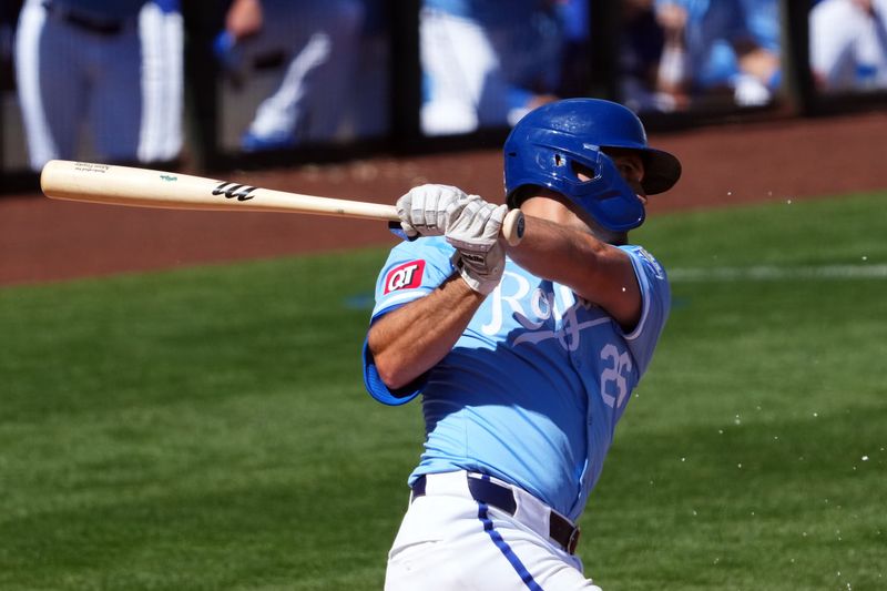 Mar 11, 2024; Surprise, Arizona, USA; Kansas City Royals third baseman Adam Frazier (26) bats against the San Francisco Giants during the first inning at Surprise Stadium. Mandatory Credit: Joe Camporeale-USA TODAY Sports